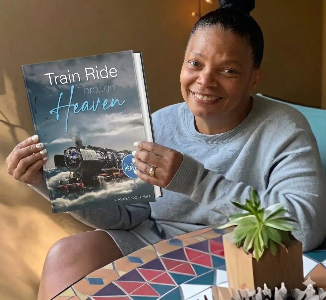 Davida Coleman holding Train Ride Through Heaven book